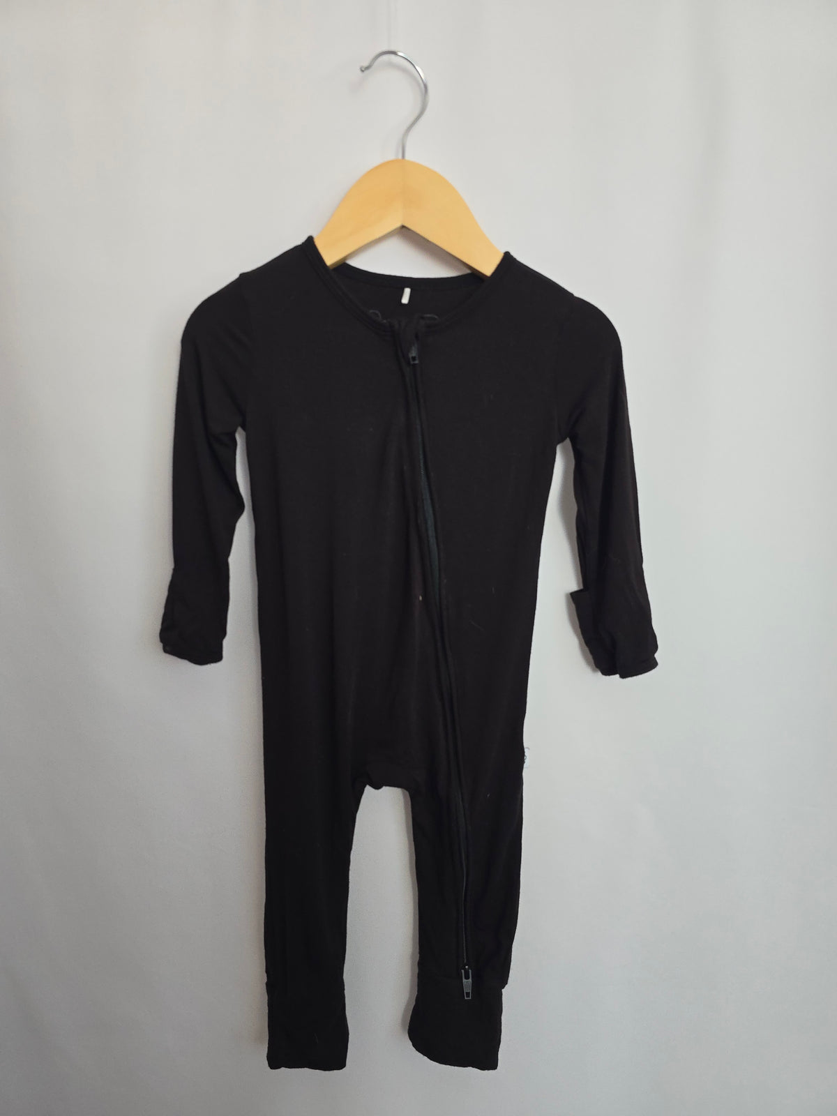 Ollee & Belle Black Zip Romper • 9-12 months