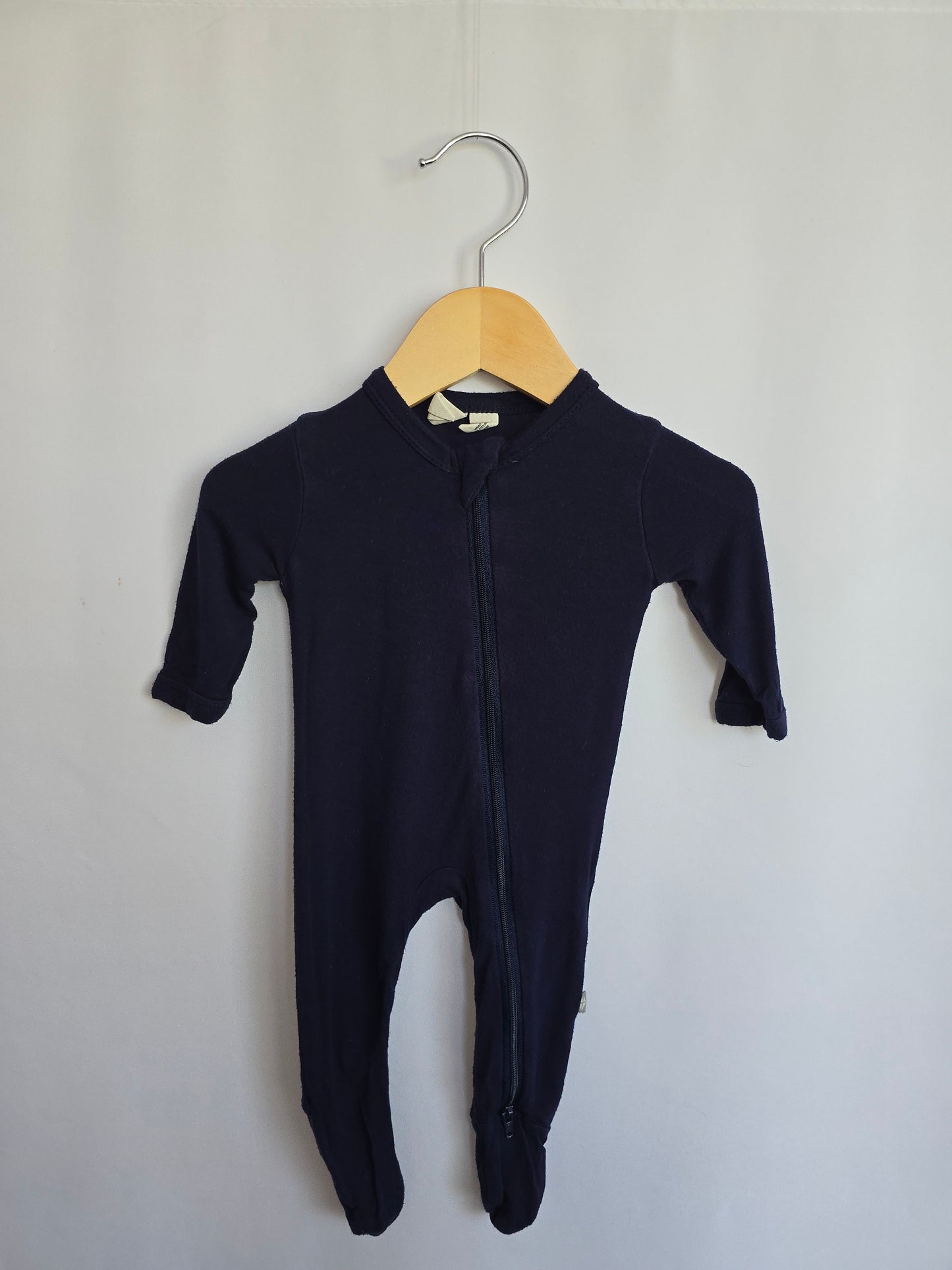 Kyte Navy Zip Footie • Newborn