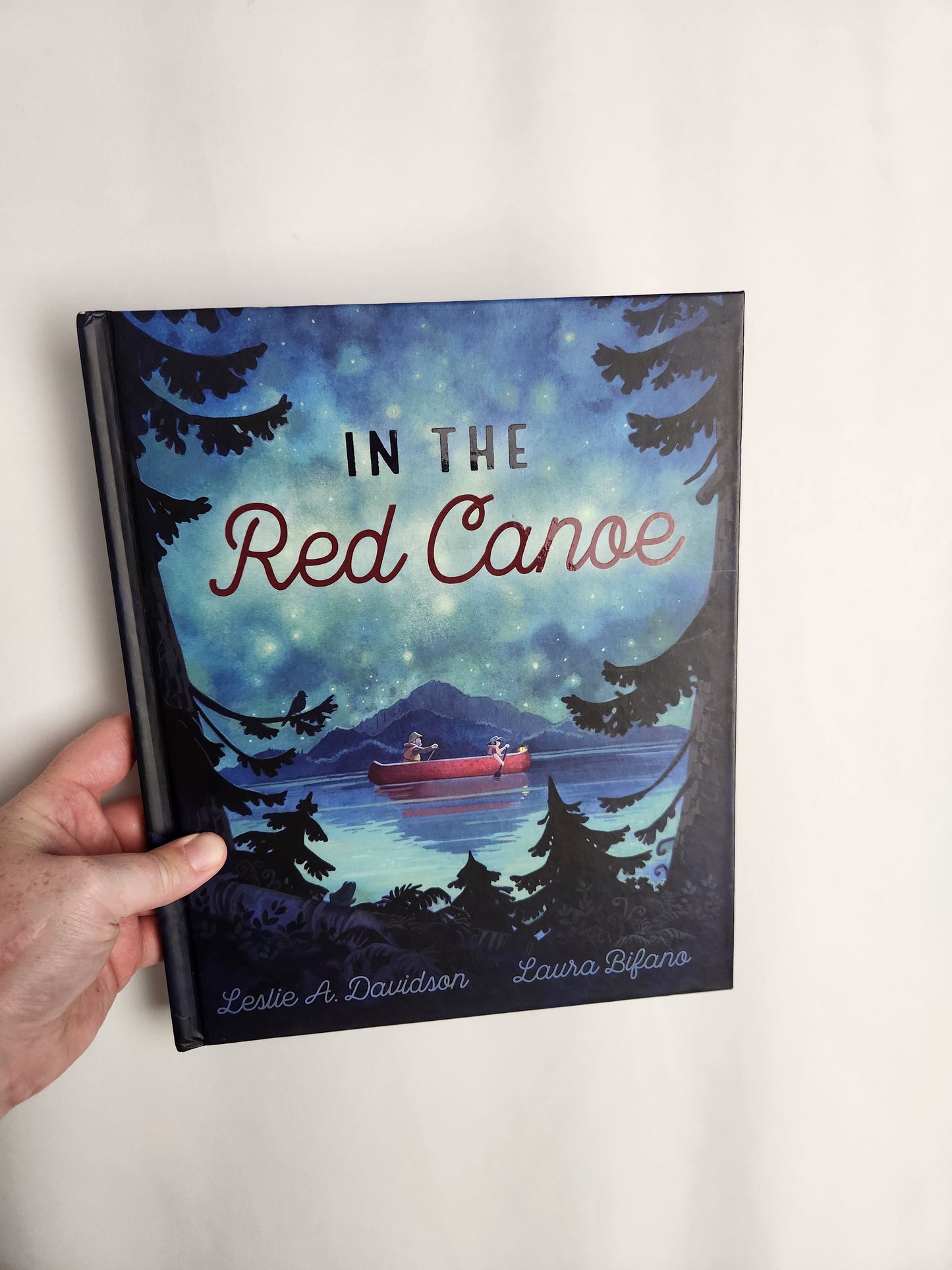 In The Red Canoe • Hardcover Book