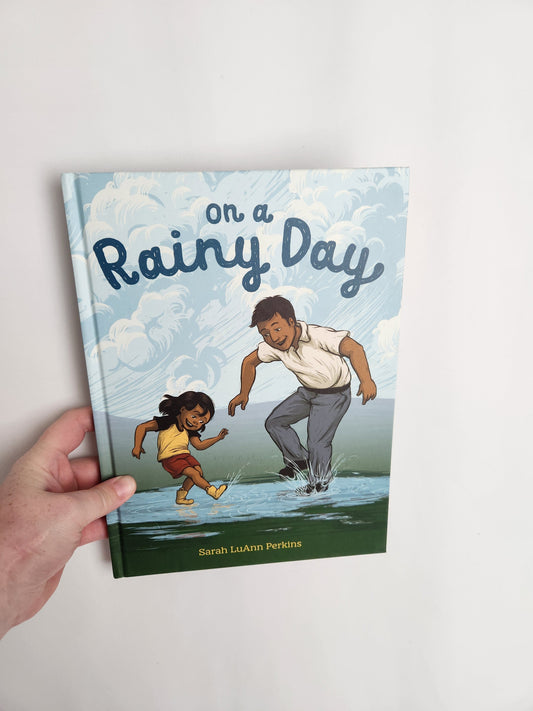 On A Rainy Day • Hardcover Book