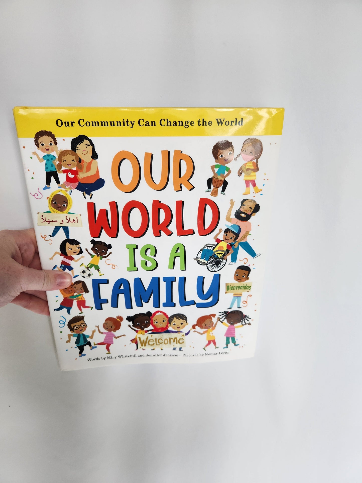 Our World Is A Family • Hardcover Book