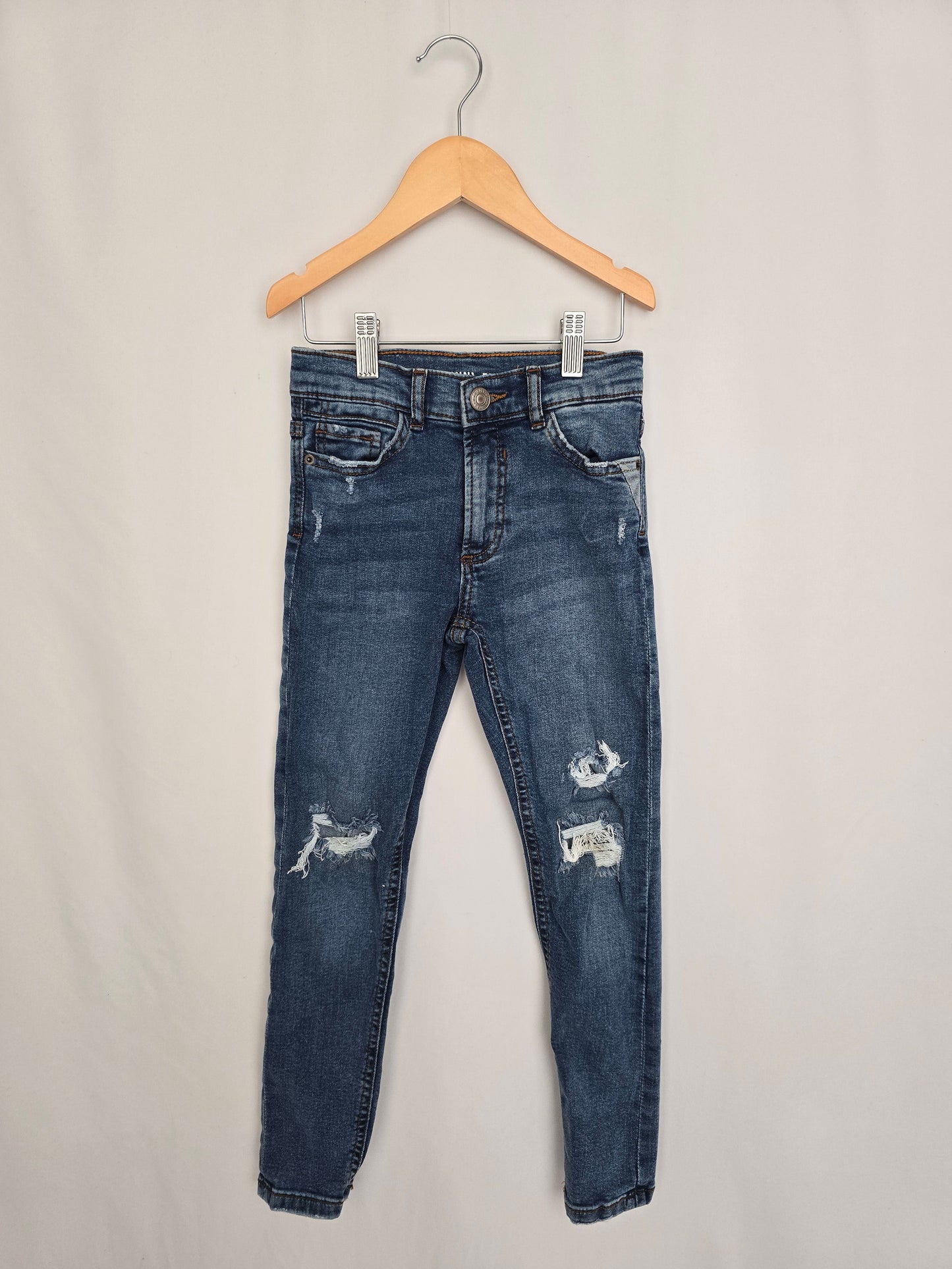 Zara Medium Wash Distressed Skinny Jeans • 8 years