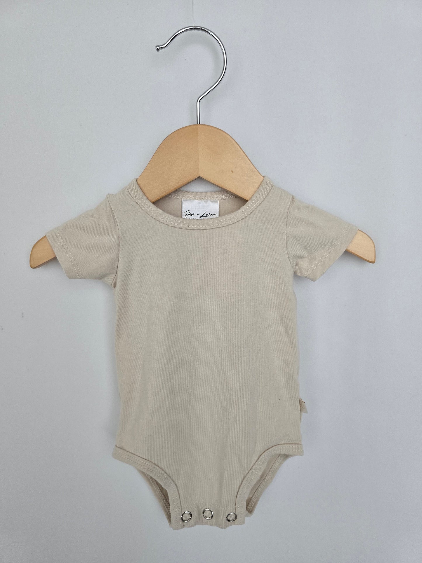 Jax & Lennon Cream Bodysuit • Newborn