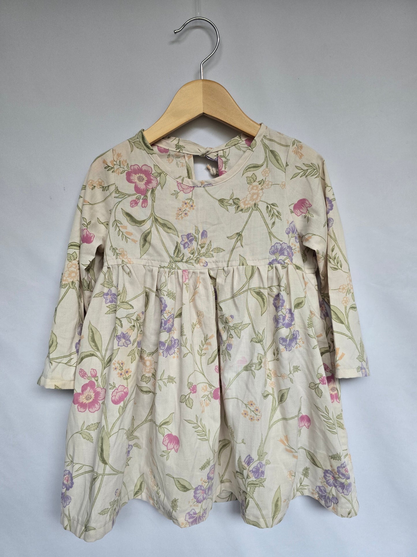 Nest & Nurture Floral Peplum Tunic *pink stain* • 4 years