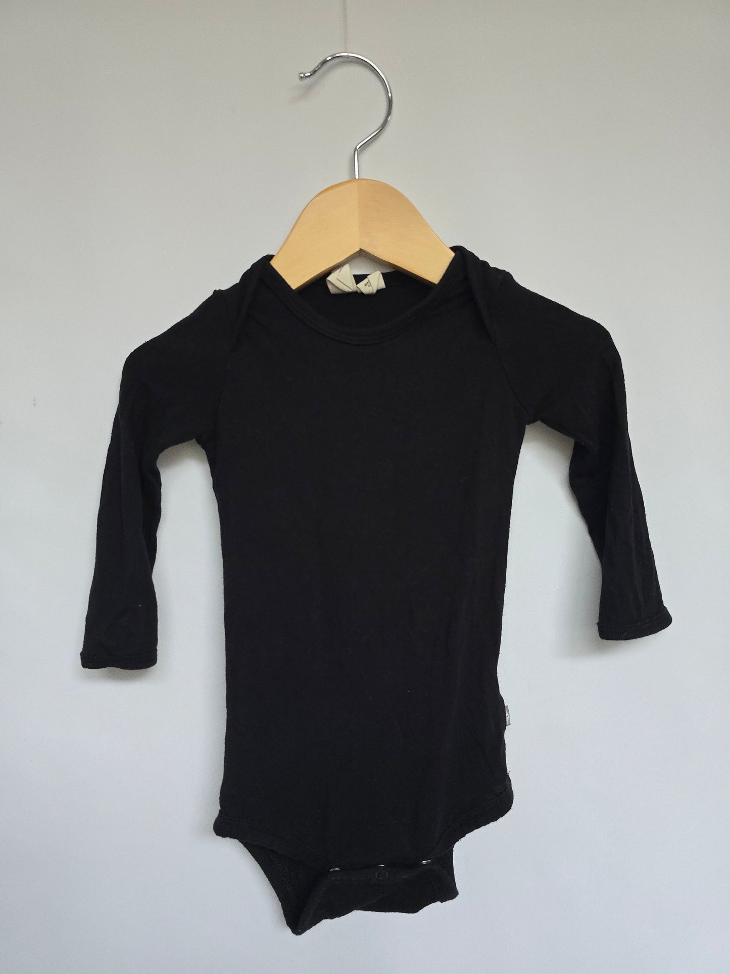 Kyte Black Long Sleeve Onesie • 6-12 months