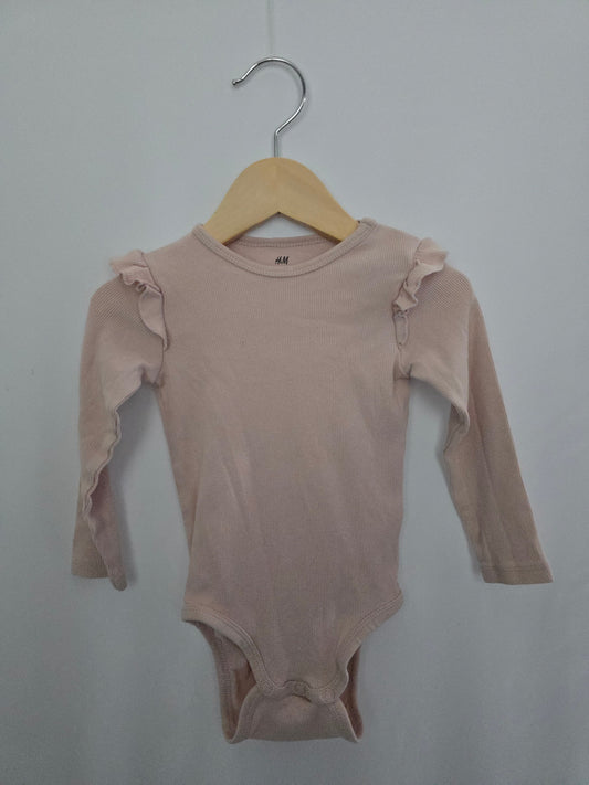 H&M Pink Ribbed Ruffle Shoulder Onesie • 9-12 months