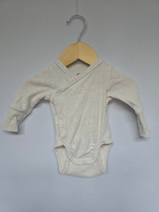 H&M Cream Ribbed Onesie • 1-2 months