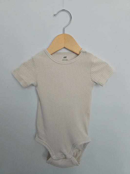 H&M Cream Ribbed Bodysuit • 6-9 months
