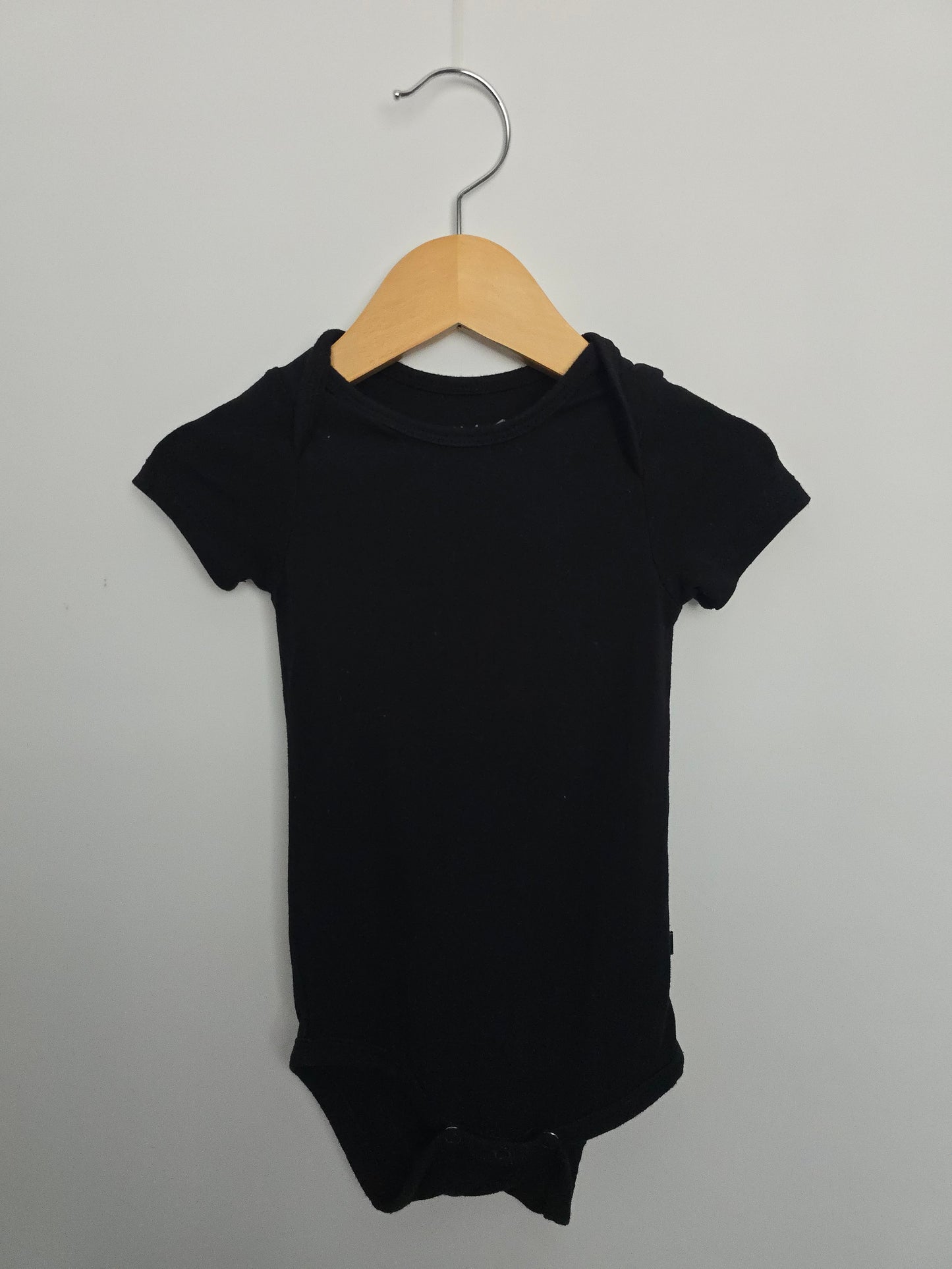 Kyte Black Bodysuit • 6-12 months
