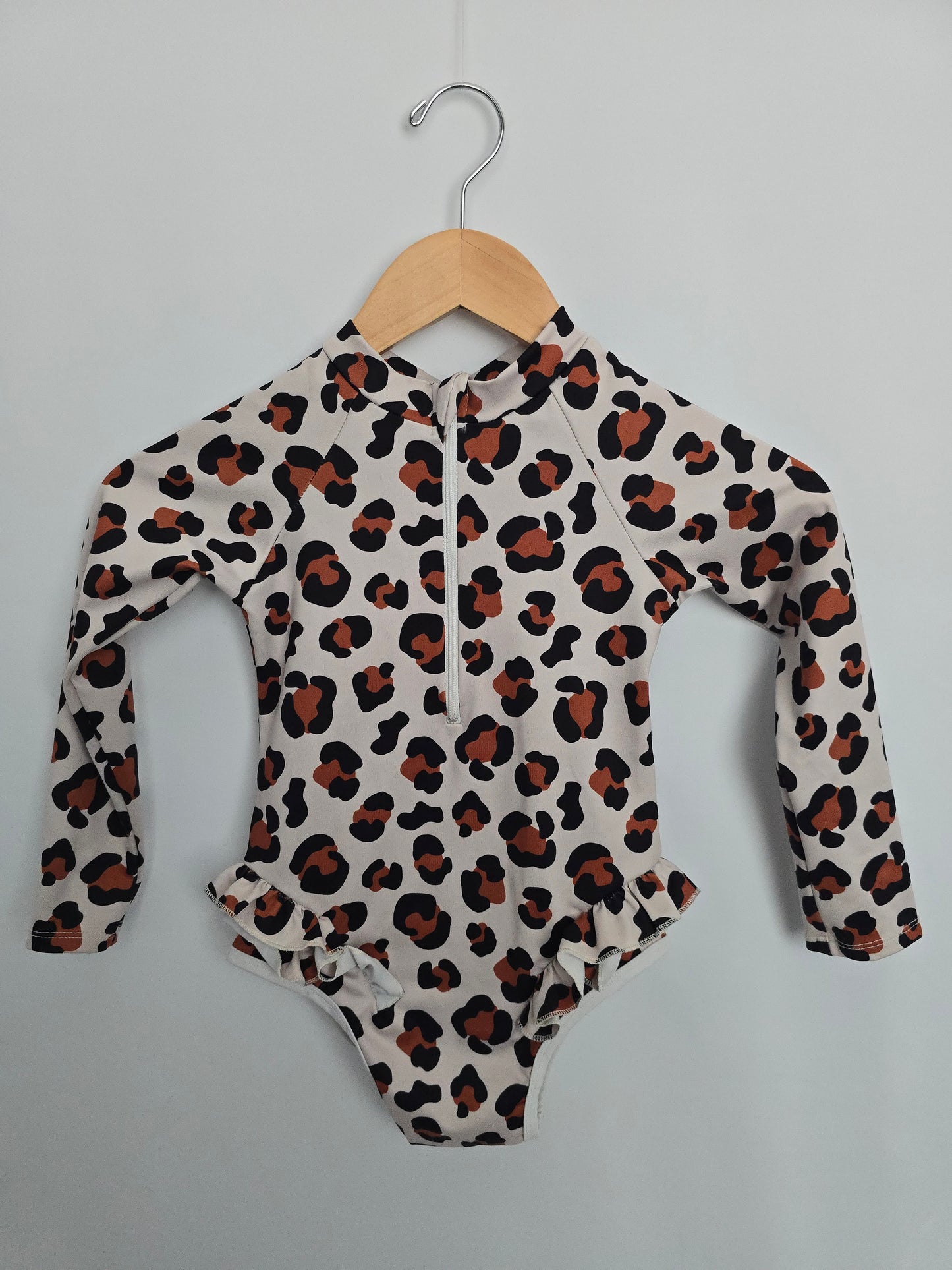 Imagine Perry Leopard  Ruffle Rashsuit • 5-6 years