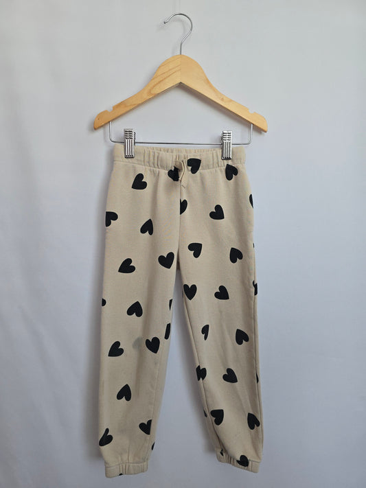 PLAY H&M Beige/Black Heart Sweatpants • 3-4 years