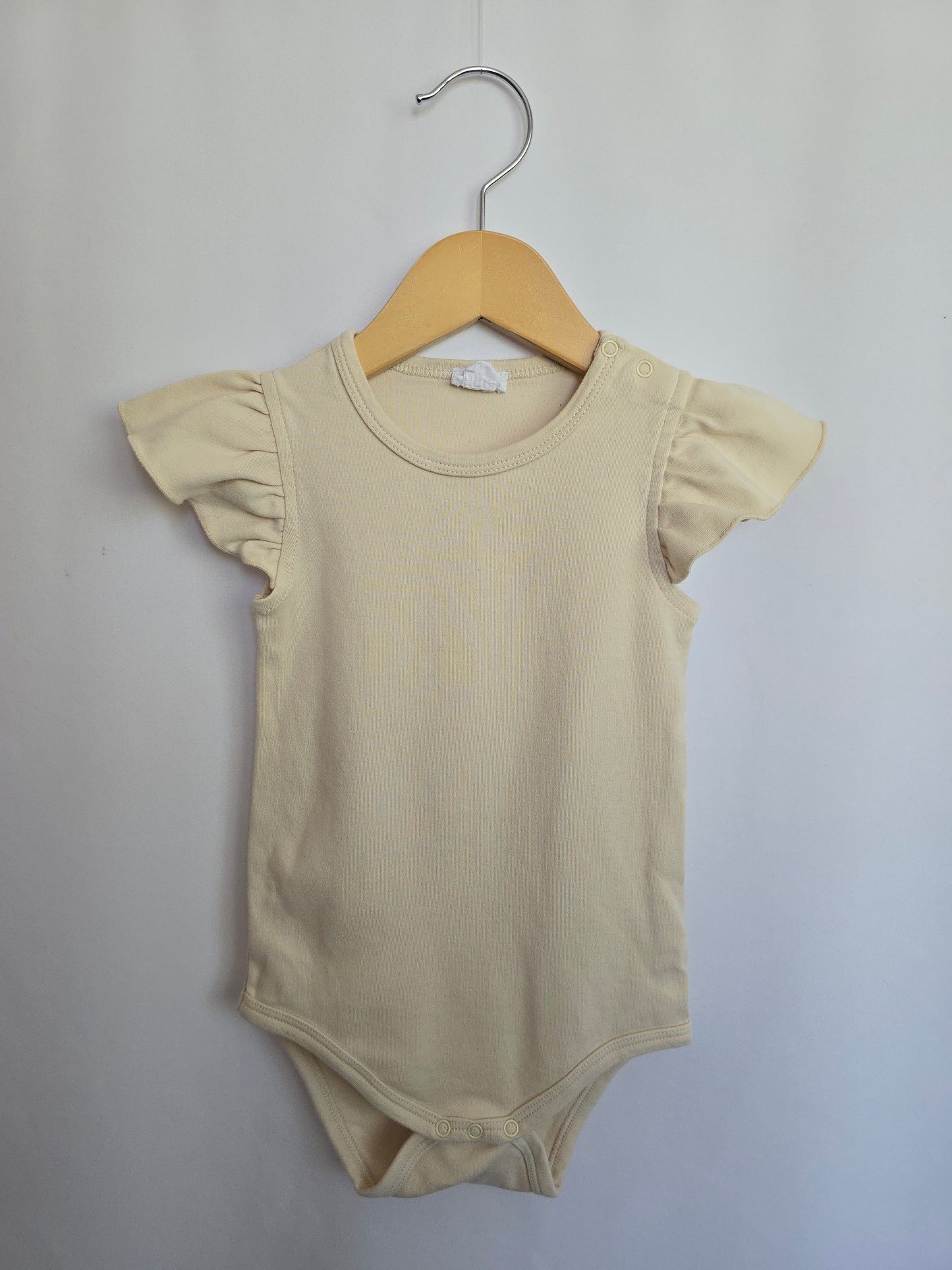 Jamie Kay Cream Ruffle Bodysuit • 2 years
