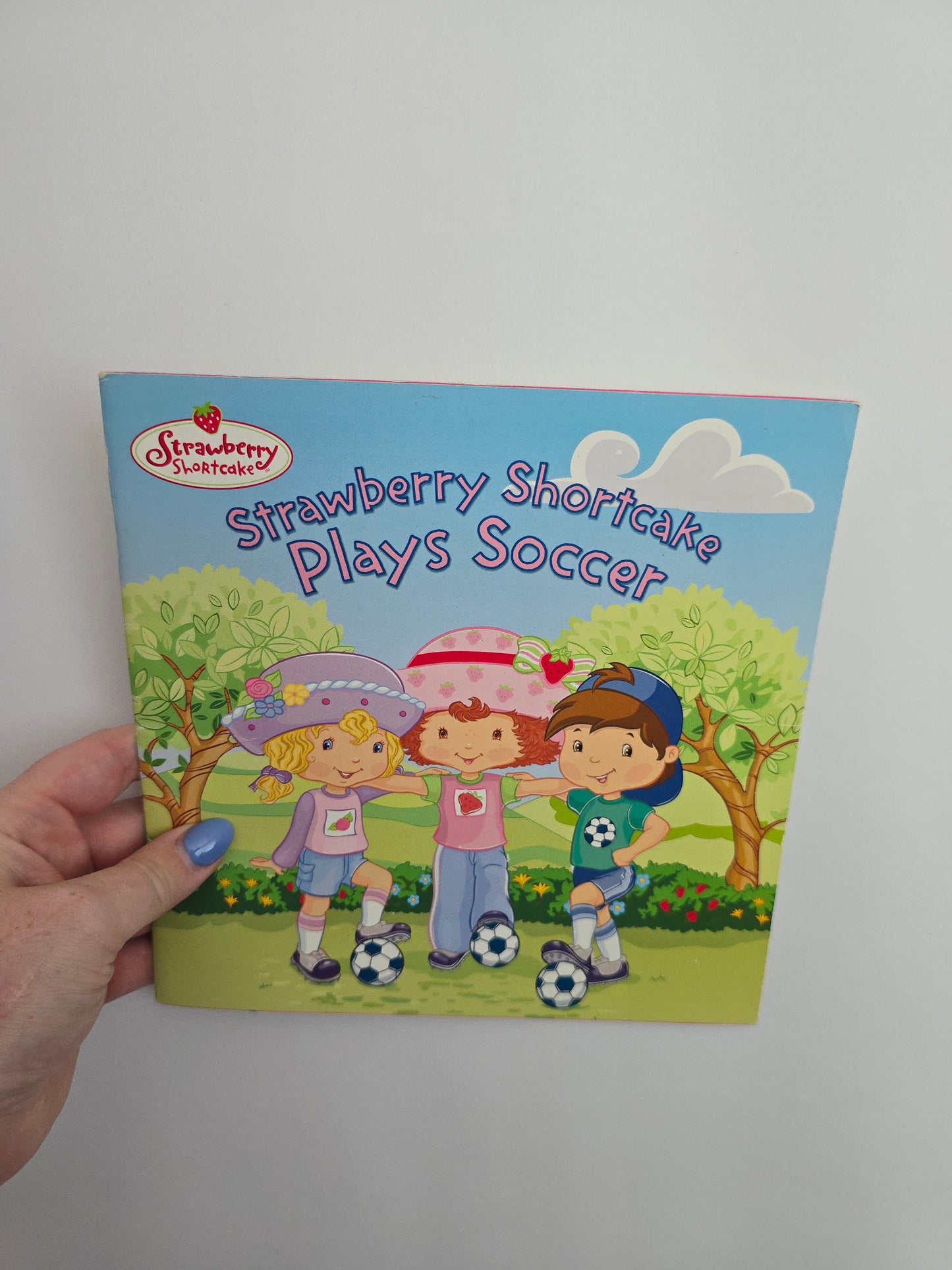 Strawberry Shortcake Plays Soccer • Softcover Book