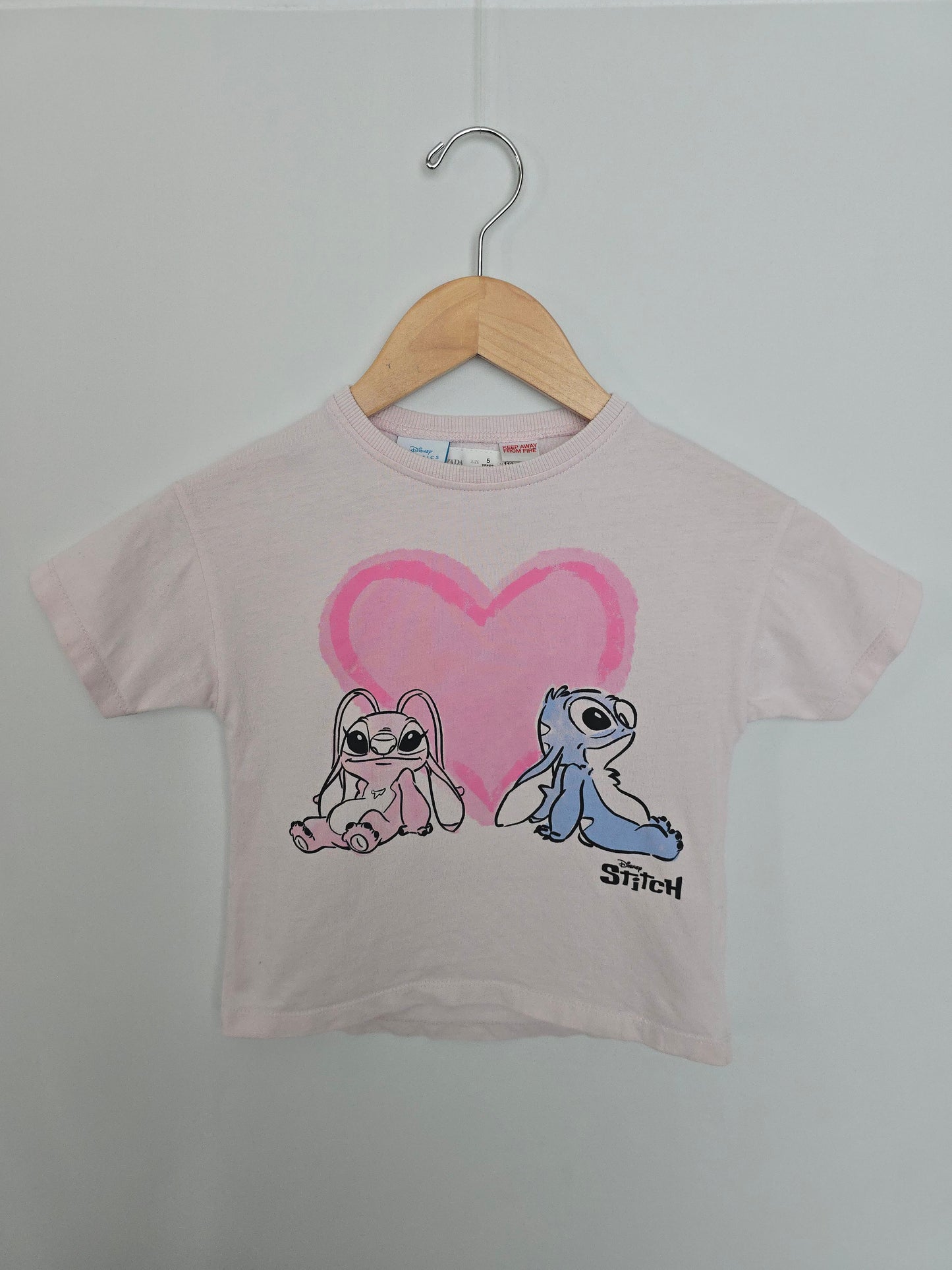 Zara Stitch Graphic Tee • 5 years